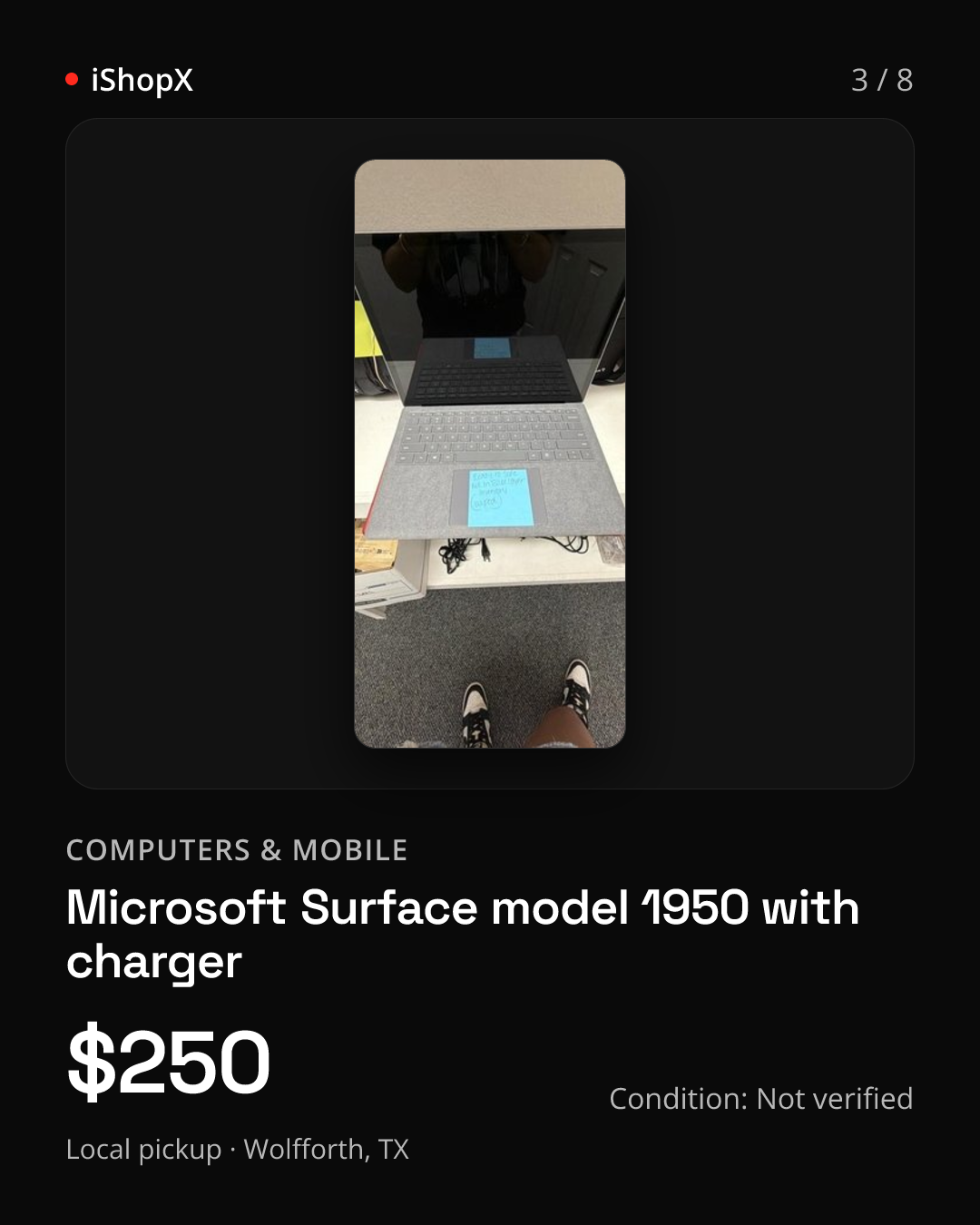 Slide 3 of 8: Microsoft Surface model 1950 with charger