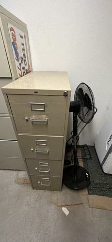 Four-drawer vertical metal filing cabinet