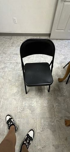 Black metal folding chairs