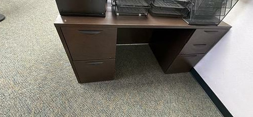 Dark five-drawer office desk